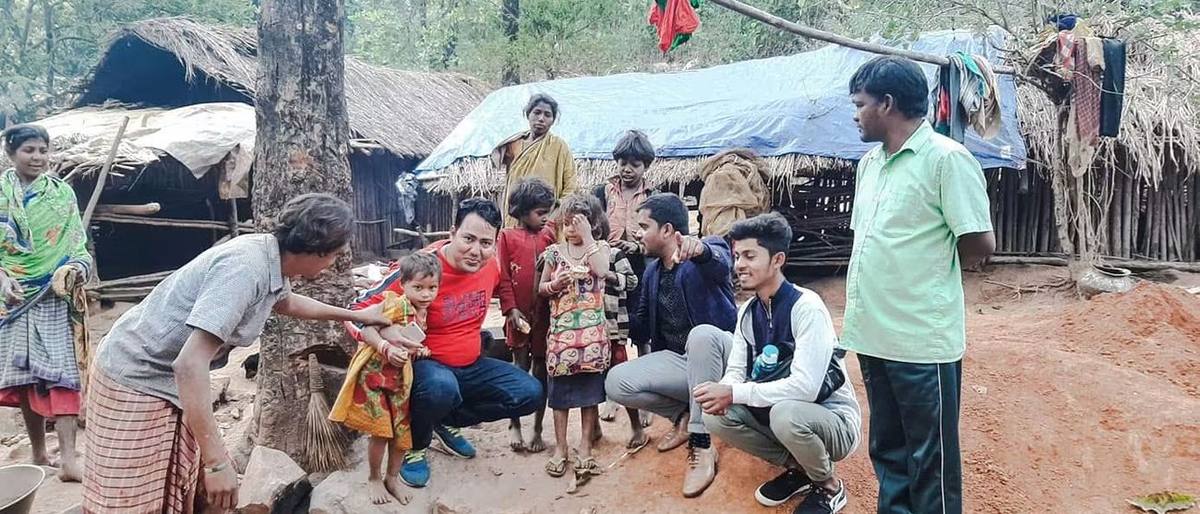A field visit to a tribal hamlet, sitting with families to understand what is needed before any programme is planned.